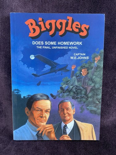 Biggles does some homework - does,