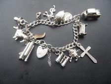 VINTAGE STERLING SILVER CHARM BRACELET WITH HEART LOCK 12 CHARMS 31.7g