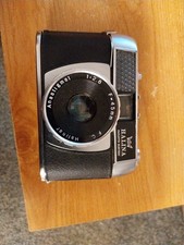 Halina Paulette electric 35mm camera , part case ,spares/repairs as untested.
