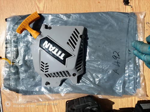 Titan petrol chainsaw likely - petrol,
