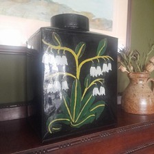 Large metal lidded tin with