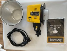 Honey badger photography studio flash light head.