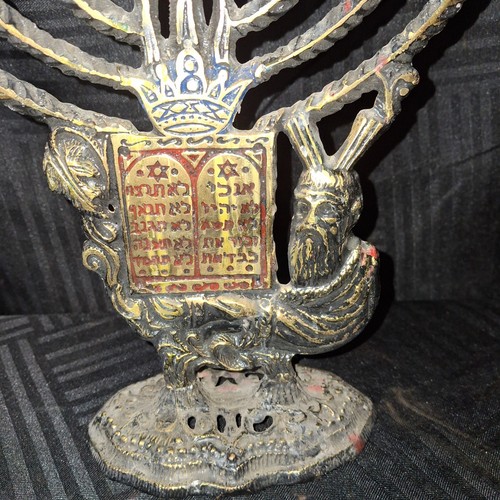 Brass menorah depicting - brass,