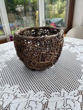 UNUSUAL MEDIUM SIZED PLANT POT COVER: RUSTIC APPEARANCE BASKETRY COVERED