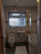 Used Bathroom P shaped bath 1500 side panel, screen, shower and toilet
