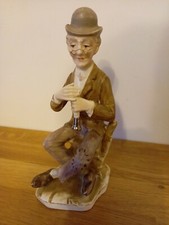 VINTAGE OLD MAN SITTING ON