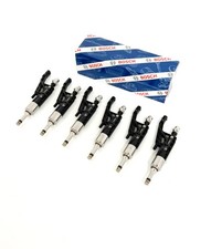 Revised fuel injectors for - 6,