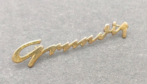Grundig badge brass logo - grundig,
