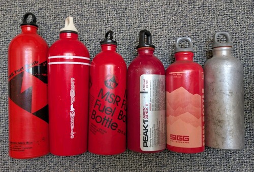 Lot six fuel bottles - six,