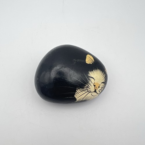 Hand painted pebble black cat - hand,