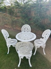 cast metal garden table and