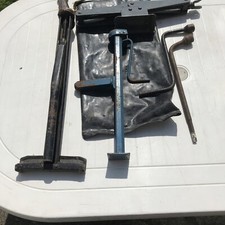 3 CAR JACKS AND 2 WHEEL NUT SPANNERS PERIOD PIECES PLUS A HOLDING BAG
