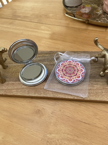 One handbag mirror - one,
