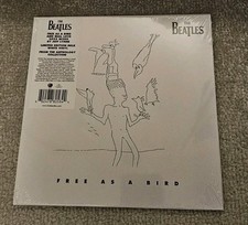 THE BEATLES FREE AS A BIRD / REAL LOVE  LTD MILK WHITE VINYL 7" NEW SEALED