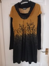 Ladies apricot yellow, black dress size m. Long sleeves.
