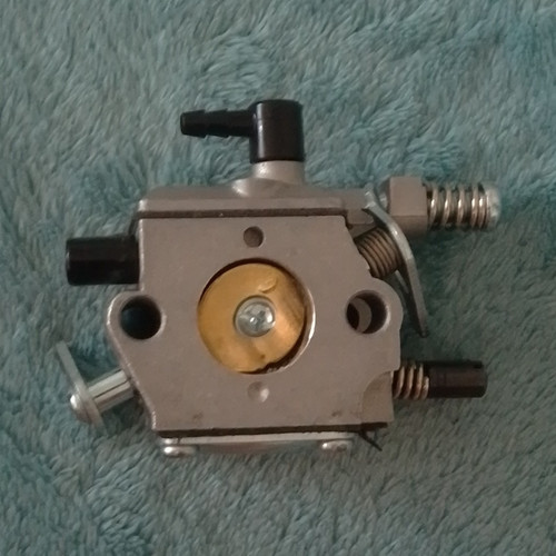 Chainsaw carburettor assembly - chainsaw,