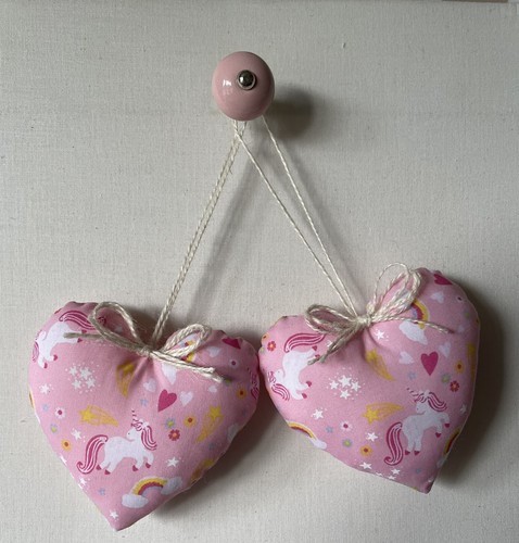 Pair heart door hangers in - of,