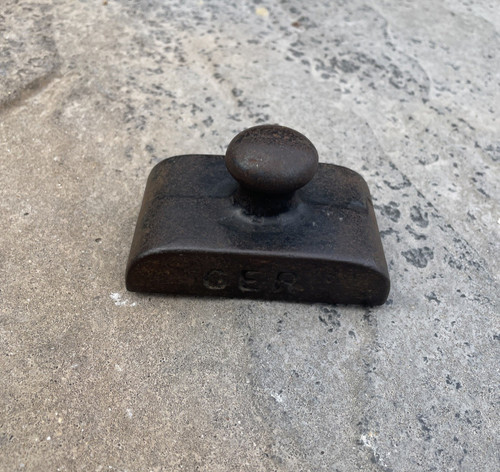 Ger cast iron paperweight - ger,