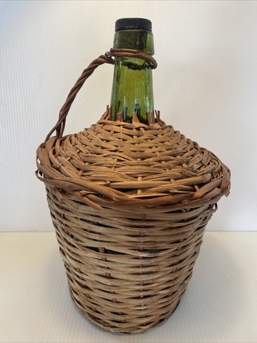 Vtg wicker wrapped demijohn - wrapped,