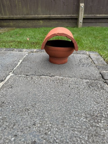 Bonnet hood chimney pot.