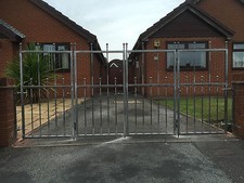 WROUGHT IRON DRIVEWAY BI