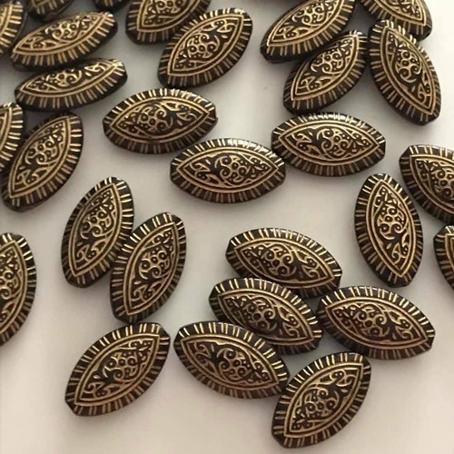 Oval patterned beads plastic - patterned,