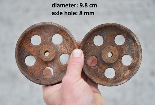 Pair small iron wheels - pair,