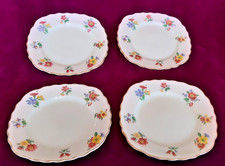Vintage four side plates by