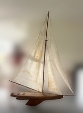 Antique wooden pond yacht with