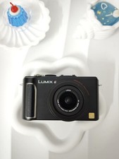 Panasonic LX3-10.1MP 1/1.63" CCD, Leica 24-60mm F2.0,Full Manual,Optical IS,720p