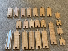 Wooden train track pieces - train,