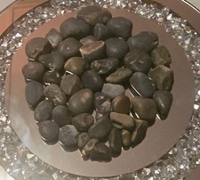 25 black beach pebbles,  sea