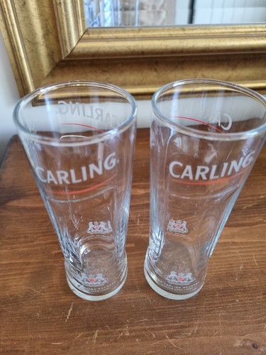 Carling half pint glasses - half,