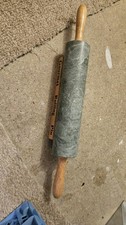 VINTAGE  MARBLE ROLLING PIN  WOODEN HANDLES. ON A WOODEN STAND. 