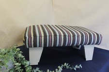 Multi coloured foot stool/ leg