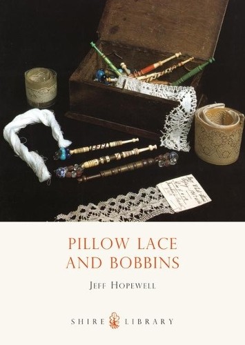 Pillow lace and bobbins - and,