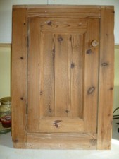 Pine cupboard door in frame. Antique old reclaim, corner.
