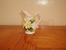 SMALL WHITE WITH RAISED YELLOW FLOWER PATTERN CHINA JUG 50mm TALL ORNAMENT