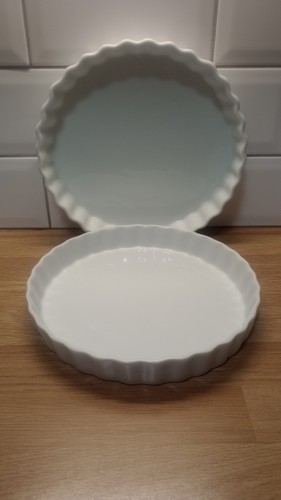 Two white ceramic flan - flan, dishes