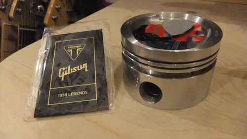 Piston guitar pick holder with - piston,