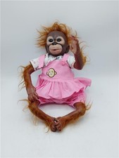 Reborn Baby Orangutan Monkey wearing Pink Pinafore Dress and Leggings 
