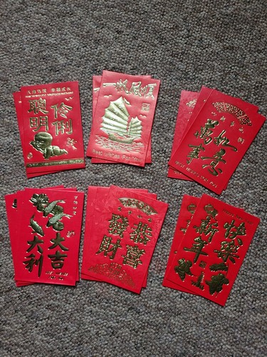 Small red money envelopes - money,