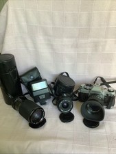 Canon AE-1 Camera Canon Lens FD 28 mm 1:2.8 Canon Lens 75-200mm Speedlite 177A