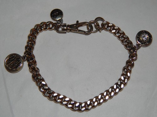 Gold tone charm bracelet - gold-tone,