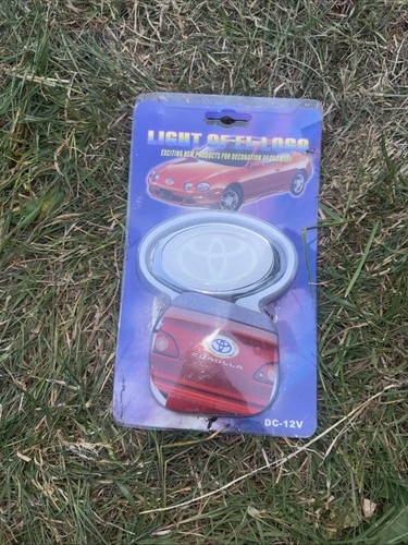 Light toyota logo car badge - light,