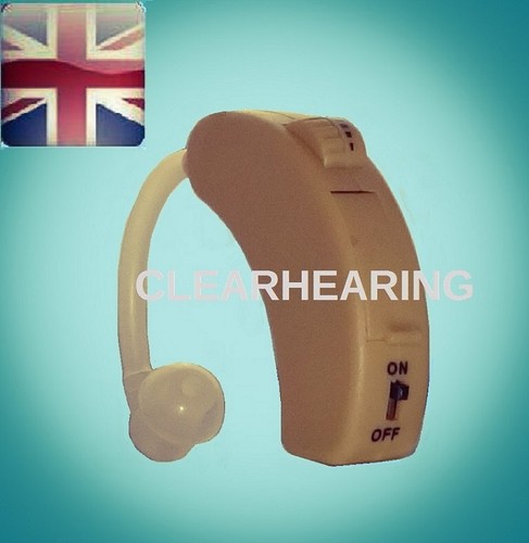 Behind either ear - behind, hearing