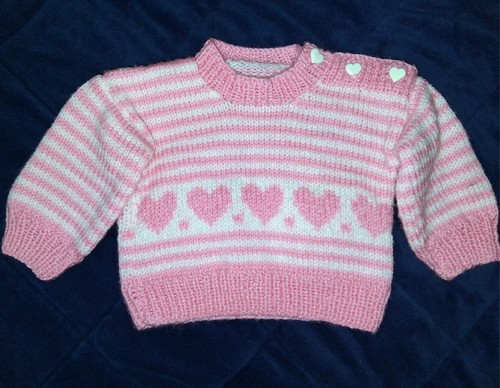 Hand knitted pink - hand,