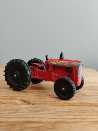 Vintage red toy tractor lone - red,