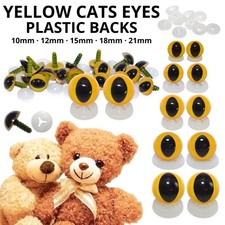 YELLOW CATS EYES PLASTIC BACKS