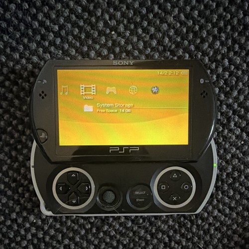 Sony psp black handheld - go,
